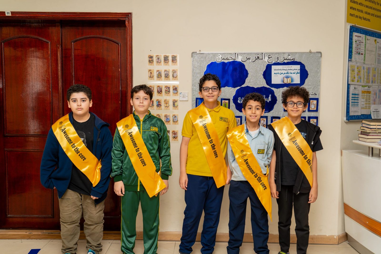 Smiling student leaders wearing their leadership sashes