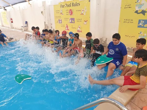 Swimming lesson fun in the school pool