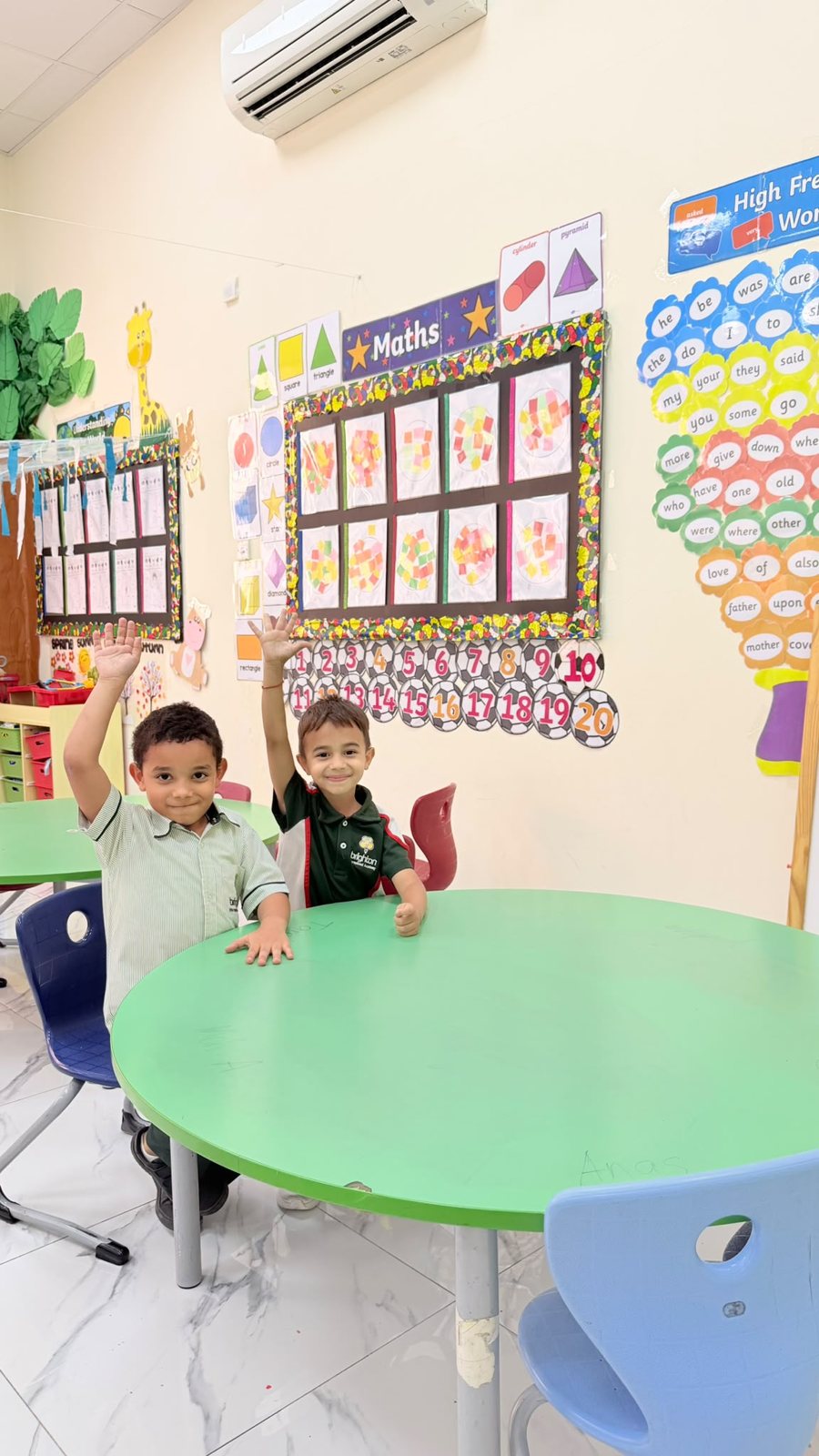 Hands up in an Early Years classroom