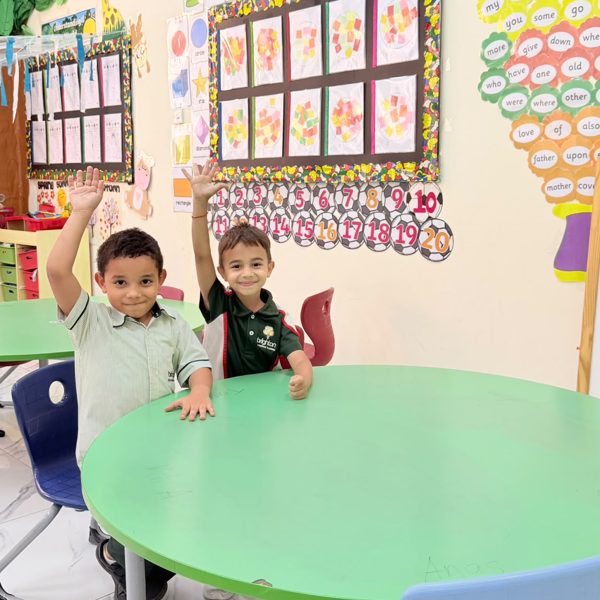 Hands up in an Early Years classroom