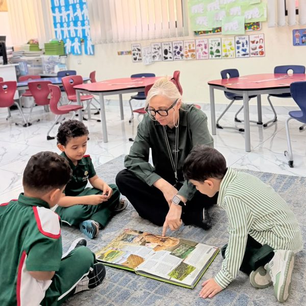A teacher guiding a small group