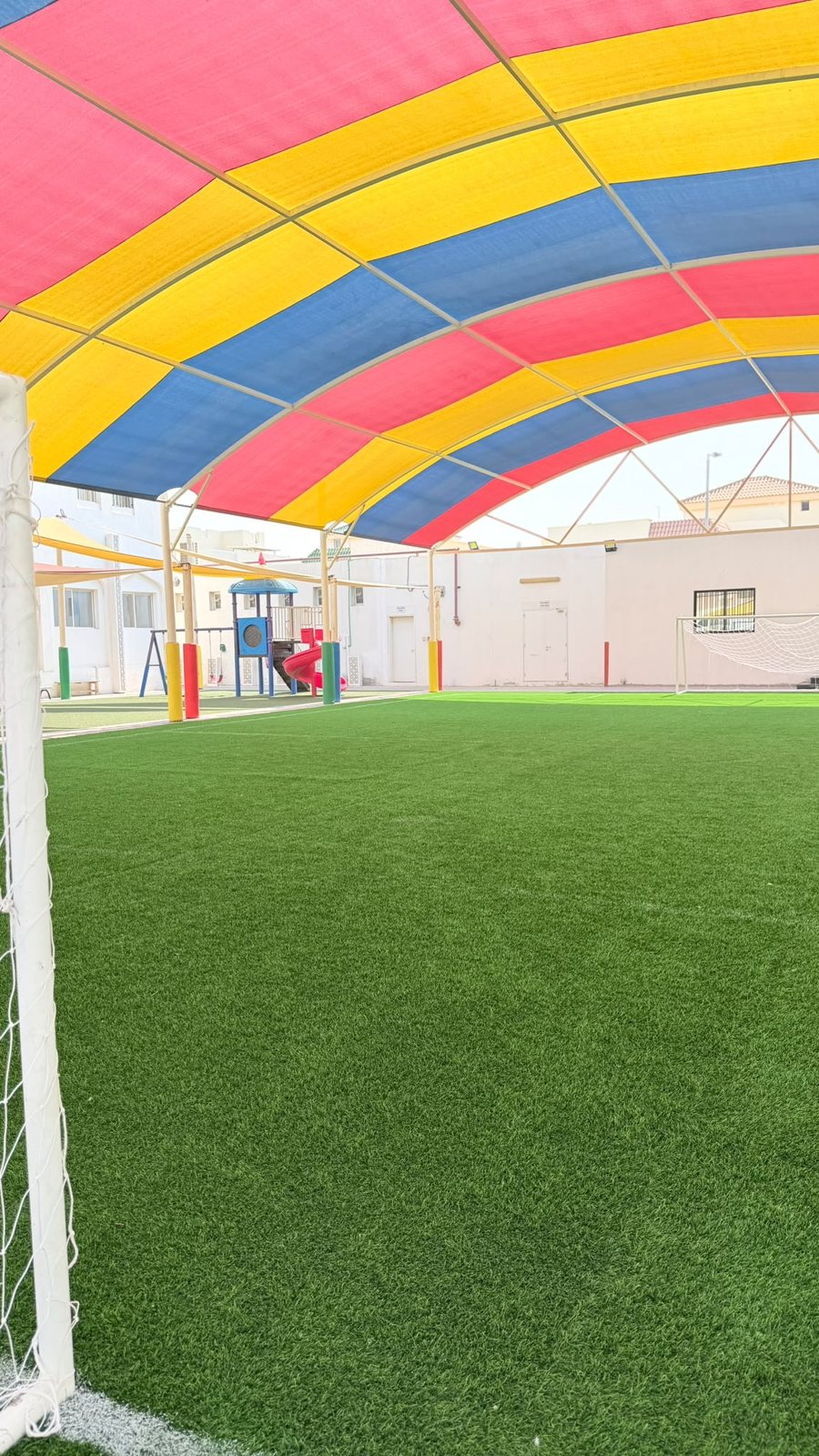 The artificial-turf football pitch