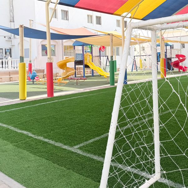 The sports pitch under its shade canopy