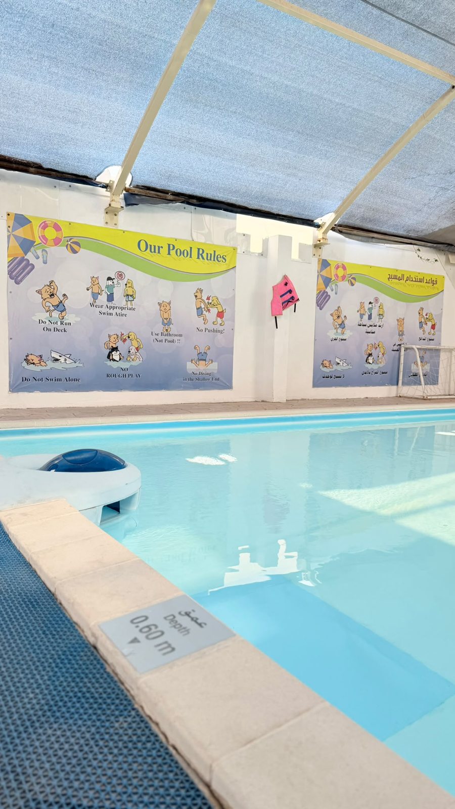 The pool, with its safety rules on display