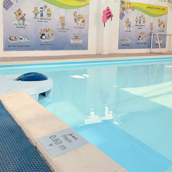 The pool, with its safety rules on display